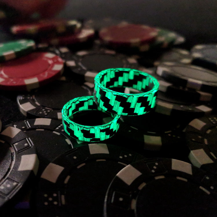 Two woven carbon fiber glow rings