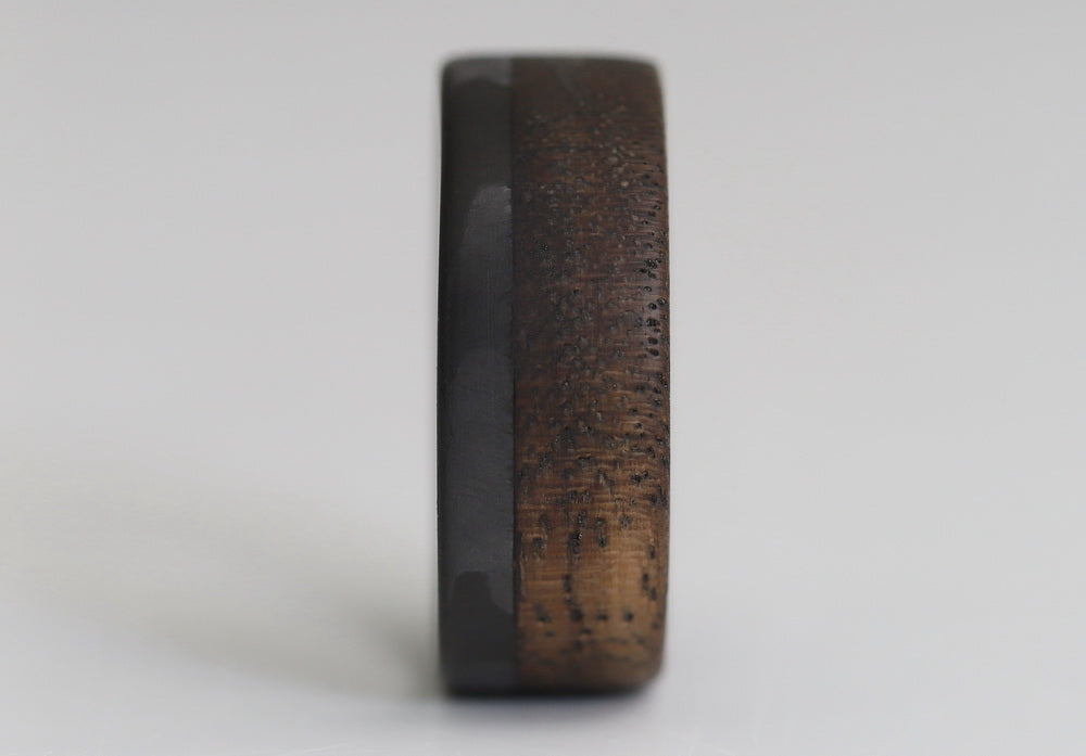 70/30 walnut wood ring with carbon fiber sleeve front view close up