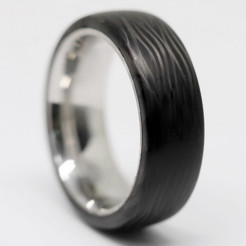 Men's Titanium Wedding Band with Carbon Fiber Pattern Close Up