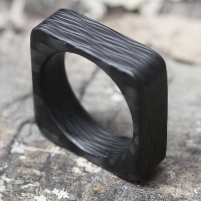 Square Carbon Fiber Wedding Ring On Rock