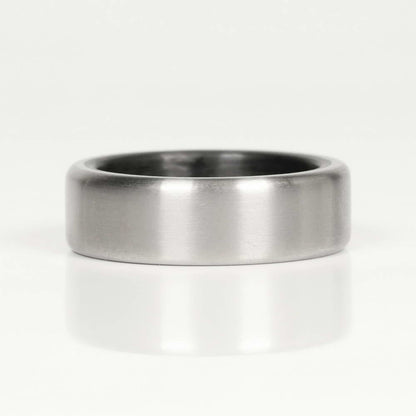 Titanium Men's Wedding Band with Carbon Fiber Interior Laying Flat