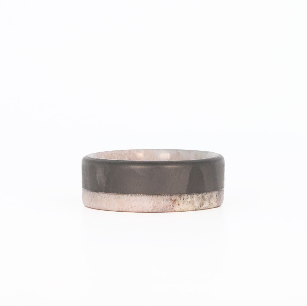 Antler wedding band with carbon fiber laying flat