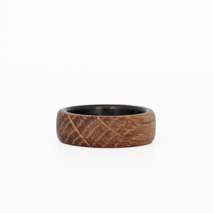 whiskey barrel ring with carbon fiber sleeve laying flat